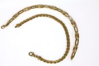 Lot 167 - A 9ct gold two colour hollow open and panel link bracelet