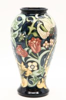 Lot 467 - A Moorcroft 'Golden Lily Blue' vase