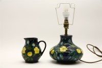 Lot 333 - A Moorcroft 'Buttercup' jug 15cm