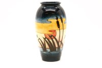 Lot 440 - A Moorcroft 'Reeds at Sunset' pattern vase