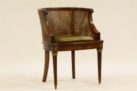 Lot 628 - A French Empire style Bergere chair