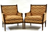 Lot 589 - A pair of French Empire style armchairs