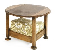 Lot 132 - An Arts and Crafts oak metamorphic table/armchair