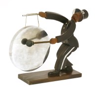 Lot 370 - An Art Deco coromandel and ebonised dinner gong
