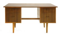 Lot 403 - A walnut desk