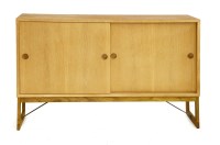 Lot 410 - A light oak cabinet