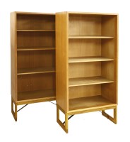 Lot 391 - A pair of light oak open bookcases