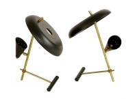 Lot 463 - A pair of black lacquered and brass table lamps
