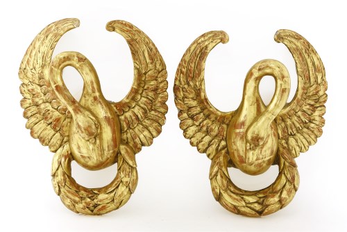 Lot 76 - A pair of carved giltwood wall brackets