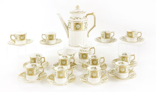 Lot 56 - A Royal Crown Derby twelve-setting coffee service
