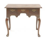 Lot 122 - A George II-style walnut lowboy