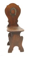 Lot 135 - A mahogany hall seat