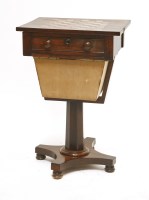 Lot 162 - A Victorian rosewood work/games table