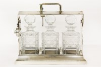 Lot 486 - A silver plated tantalus