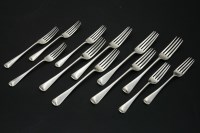 Lot 152 - A set of six silver table forks