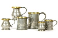 Lot 304 - Six pewter tankards