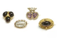 Lot 28 - A gold amethyst and split pearl twin heart brooch