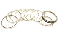 Lot 98 - A silver hinge bangle with engraved decoration