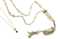 Lot 115 - An 18ct gold sapphire and diamond drop pendant on an 18ct gold trace chain