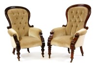 Lot 621 - A pair of Victorian spoon back ladies and gentlemen's chairs