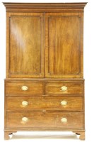 Lot 556 - A 19th century mahogany linen press