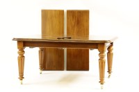 Lot 692 - A Victorian mahogany wind out dining table