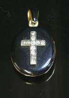 Lot 70 - A Victorian gold diamond set memorial locket