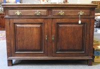 Lot 556A - An early 20th century oak sideboard