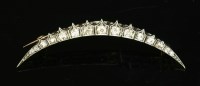 Lot 47 - A late Victorian diamond crescent brooch