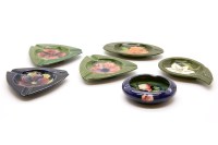Lot 122 - Three Moorcroft triangular ashtrays