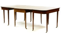 Lot 483 - A Regency mahogany three section D end dining table