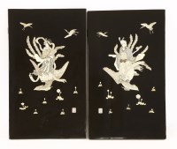 Lot 415 - A pair of Japanese black-lacquered panels