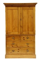 Lot 476 - A Victorian stripped pine linen press