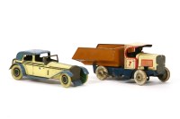 Lot 234 - A tin plate clockwork chauffeur driven car