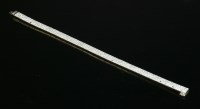 Lot 402 - A white gold diamond set bracelet with square links