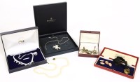 Lot 92 - A pair of 9ct gold engine turned decorated cufflinks