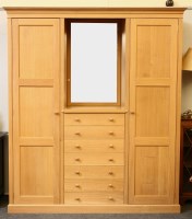 Lot 433 - A bespoke pale oak wardrobe