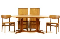 Lot 469 - A 1960s/70s teak dining suite