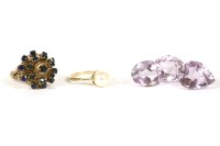 Lot 28 - A sapphire cluster ring