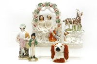 Lot 245 - Seven Staffordshire figures