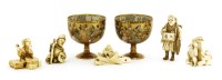 Lot 699 - A collection of Japanese ivory okimono