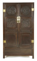 Lot 439 - A Chinese hardwood cabinet