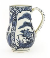 Lot 700 - A Japanese blue and white tankard