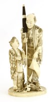 Lot 478 - A Japanese ivory okimono
