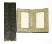 Lot 565 - A pair of Chinese wood paperweights