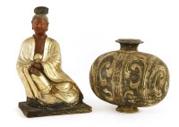Lot 577 - A Chinese plaster Guanyin