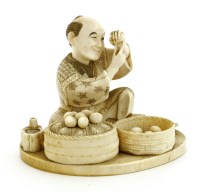Lot 481 - A Japanese ivory okimono