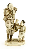 Lot 482 - A Japanese ivory okimono