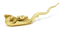 Lot 709 - A Japanese ivory okimono