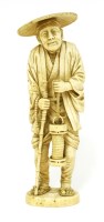 Lot 486 - A Japanese ivory okimono